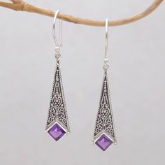 Ideal for a beautifully bold look this pair of stunning dangle earrings comes from talented artisan Eka Devi. Handcrafted in Bali the earrings are adorned with over one carat of faceted square amethyst gemstones that sparkle magnificently from bezel settings. Each earring features a long kite-shaped sterling silver pendant decorated with intricate Balinese bun motifs that are accentuated by oxidized accents. Silver Metal Clay, Bali Jewelry, Silver Dangle Earrings, Sterling Silver Dangle Earrings, Bridal Gold Jewellery, Square Earrings, Balinese, Bridal Jewelry Sets, Jewelry Business