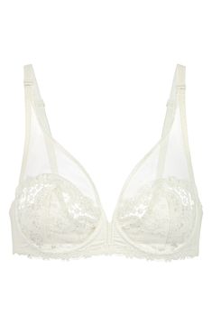 Vibrant blue embroidery veils the sheer tulle cups of this captivating, French-designed bra that's fashioned to give the illusion of a demi cup silhouette. Lined Polyester/nylon/elastane Hand wash, line dry Imported Lingerie Cream Lace Underwire Bra, Sheer Underwire Bra For Wedding, Lace Sheer Bra For Wedding, Elegant White Bra With Removable Cups, Wedding Sheer Underwire Bra, Wedding Underwire Sheer Bra, Delicate Lace Wedding Bra, Cream Underwire Bra With Delicate Lace, Wedding Bra With Removable Pads In White