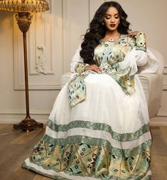 Introducing our exquisite Elegant Habesha Dress, a perfect blend of ethnic charm and contemporary elegance. Crafted with intricate details, this dress is designed to make a statement. Eritrean Clothing, Eritrean Dress, Ethiopian Wedding, Ethiopian Clothing, Habesha Dress, Ethiopian Traditional Dress, Ethiopian Dress, Habesha Kemis, Grad Dresses