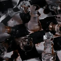 the chess board is covered in brown and white pieces