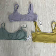 3 Nwt Pacsun Swim Tops Bundled. Green & Yellow Are Ribbed, Purple Is Textured. Green Has Adjustable Shoulder Straps. Yellow Seamless Beach Tops, Yellow Tops For Poolside Spring Season, Yellow Seamless Summer Top, Casual Yellow Tops For Poolside, Yellow Beachwear Top For Poolside, Trendy Tops For Summer Sunbathing, Yellow Seamless Swimwear For Spring, Solid Tops For Sunbathing In Summer, Yellow Sleeveless Top For Poolside