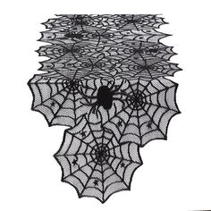 a spider web is shown on top of a white background, with black dots in the center