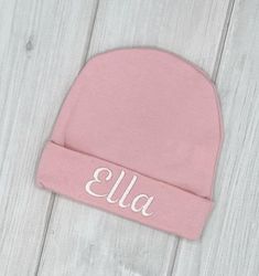 Personalized embroidered  baby beanie hat.Size: fit 0-3mFabric: 100% cottonTo personalized, leave the baby’s name in the personalization tab or note to seller during check out. If you prefer other color thread feel free to put it down as well. Different font available as well. Leave your choice on the personalized tab if you prefer a different font. I’ll use default font in the first picture of listing if no font is mentioned. Please PM me if you have any questions.Made in smoke free and pet fri Cute Cotton Cap Beanie, Cute Cotton Beanie Cap, Pink Cotton Beanie (one Size Fits Most), Pink Cotton Beanie, One Size Fits Most, Pink Cotton Hat Gift, Embroidered Cotton Beanie One Size Fits Most, Cute Adjustable Cotton Beanie, Embroidered Cotton Beanie (one Size Fits Most), Embroidered Cotton Beanie, One Size Fits Most