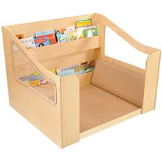 a wooden toy book holder with books in it's center and two open compartments