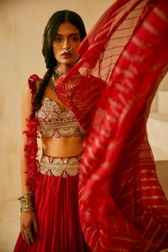 Editor's Note Look Extraordinary In This Beautiful Red Organza Lehenga Set With Kasab, Sequins, And Mirror Work Embroidery On The Blouse And Skirt Waist. The Exaggerated Hand-made Tassels On Th... Pleated Lehenga, Mirror Work Embroidery, Blouse Yoke, Organza Lehenga, Organza Dupatta, Desi Fashion, Mirror Work, Luxury Women, Luxury Fabrics