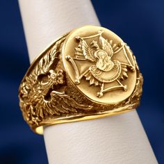 The design of this ring has the Historic Polish White Eagle engraved on either side of the ring. The top design is an image of Our Lady of Czestochowa (Matka Boska Czestochowska) in front of Independence Eagle on top of the Scouts Badge. 14K Yellow Gold Ring face measures 0.562" x 0.687" Made in Poland Packaged in gift jewelry box. Gold prices fluctuate often. What you see online is today's price. Formal Oval Engraved Ring With Intaglio, Oval Engraved Ring With Intaglio For Formal Events, Luxury Diamond Signet Ring Collectible, Victorian Yellow Gold Rings With Polished Finish, Classic Engraved Rings For Ceremonial Occasion, Classic Engraved Rings For Ceremonies, Classic Ceremonial Engraved Rings, Luxury Engraved Signet Ring Collectible, Ceremonial 14k Gold Engraved Ring With Polished Finish