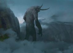 a giant horned animal standing on top of a cloud filled mountain