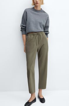 Look put-together but stay comfy in these flowy, high-rise, jogger-style trousers made with an elastic waist and relaxed straight legs. Elastic/drawstring waist Side slant pockets 93% viscose, 7% polyester Machine wash, line dry Imported Versatile Relaxed Fit Ankle-length Joggers, Baggy Ankle-length Joggers With Elastic Waistband, Loosely Fitted Ankle-length Joggers With Elastic Waistband, Khaki Wide-leg Sweatpants With Elastic Waistband, Cotton Straight-leg Joggers With Elastic Cuffs, Platform Slippers, Favorite Daughter, Fashion Joggers, Maternity Shops