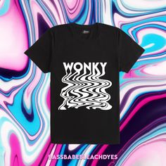 a black t - shirt with the words wonky on it in front of an abstract background