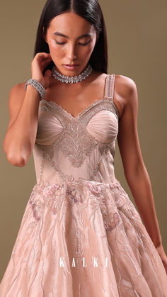 Witness the pinnacle of style in our dust pink gown, embellished with hand-embroidered petal shape sequin, cut dana work, and beadwork in pink shades.
This outfit is made from organza net fabric.
Wear this dress to your forthcoming parties and wedding ceremonies. Organza Gown, Dust Pink, Organza Gowns, Pink Gown, Pink Shades, Embroidered Organza, Pink Gowns, Net Fabric, Wedding Ceremonies