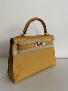 *The bag comes in full set with original store receipt. Mini Kelly, The Bag, Gold Leather, Full Set, Gold Hardware, Top Handle Bag, Leather, Gold