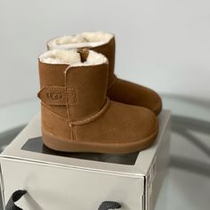 Size 04/05 Color Tan New Ugg Boots Too Small For My Baby She Got This As A Christmas Gift . Toddler Ugg Boots, Brown Uggs, Baby Ugg Boots, Girls Ugg Boots, Kids Ugg Boots, Chestnut Boots, Baby Uggs, Bailey Bow Uggs, Ugg Mini