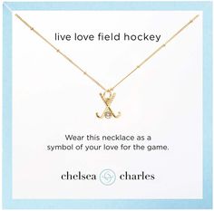 a necklace with the words live love field hockey on it and an anchor charm in gold