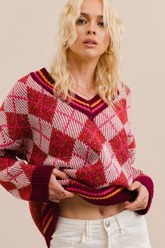 -Color: Rose -V-neck loose fit argyle pullover knit sweater -Multi color -V-neck -Long sleeves -Ribbed on neck, cuffs and hem -Content: 100% Acrylic -Imported -Model is 5' 10" 31-25-35 and wearing a size Small V-neck Top With Argyle Pattern For Fall, Fall V-neck Top With Argyle Pattern, Fall Argyle V-neck Top, Winter V-neck Argyle Pattern Top, Cozy Multicolor V-neck Sweater, Knitted Pullover Sweaters, Modern Fashion, V Neck Sweater, Vneck Sweater