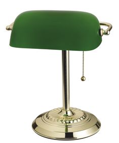 a green table lamp on a white background