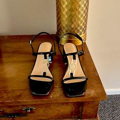 Brand New, Never Worn. They Have Gold Trim, 2 Inch Heel, Size 9. Casual Black Tommy Hilfiger Sandals, Tommy Hilfiger Black Sandals For Spring, Tommy Hilfiger Black Open Toe Sandals, Casual Open Toe Heels By Tommy Hilfiger, Chic Tommy Hilfiger Open Toe Sandals, Casual Summer Heels By Tommy Hilfiger, Tommy Hilfiger Summer Casual Heels, Tommy Hilfiger Casual Summer Heels, Casual Tommy Hilfiger Summer Heels