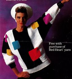 an advertisement for red heart yarns featuring a woman in a white hat and colorful sweater