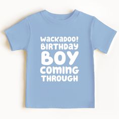 a blue shirt that says wackaboo birthday boy coming through