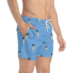 Nothing can swoosh down the summer heat like a dive into the sea - or into the nearest pool. These personalized swim trunks are here to take on your exclusive designs and most playful patterns. With an all-over-print capability accompanied by vivid colors, these swim trunks help you conquer the summer in custom style.  .: Material: 100% polyester .: Extra light fabric (3.54 oz/yd² (120 g/m .: Fast-dry fabric .: Mesh basket lining  .: Mesh-lined side pockets .: Printed care label inside .: Drawst Bandit Bluey, Mens Swim Trunks, Summer Heat, Care Label, Swim Trunks, Exclusive Designs, Drawstring Waist, Light Fabric, Bathing Beauties