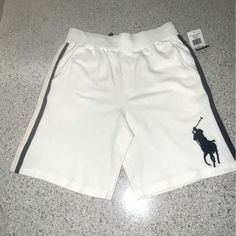 Brand New White/ Dark Blue Trim Drawstring Inside Two Sided Pockets Elastic Waste Band 10-12 (M) White Summer Playwear Shorts, White Playwear Shorts, White Cotton Bottoms For Playwear, White Shorts For Playwear In Spring, White Cotton Playwear Shorts, White Shorts For Spring Playwear, Dark Blue Trim, Polo Tshirts, Navy Blue Flats