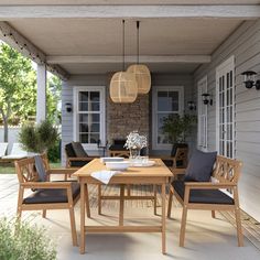 a wooden table sitting on top of a patio