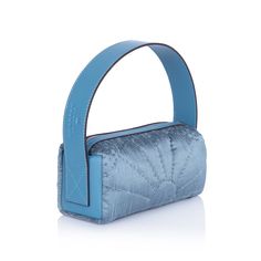 Main fabric silk. Traditionally crafted bag. Fully lined. Logo stamp on hand strap. Genuine leather trim and hand strap. A top zip fastening. Hand-made in Turkey. Dimensions may differ upto 0.8 inches. Height: 3.9'' Width: 9'' Depth: 3.9'' Shoulder Strap: 16.5'' Blue Shoulder Bag With Round Handle For Evening, Blue Leather Bag With Round Handle, Blue Leather Bags With Round Handle, Blue Shoulder Bag With Round Handle, Luxury Blue Bag With Round Handle, Luxury Blue Bags With Round Handle, Blue Shoulder Bag With Detachable Strap And Round Handle, Evening Blue Shoulder Bag With Leather Handles, Crafted Bag