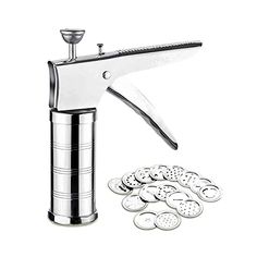 a silver and black pepper grinder next to lots of white buttons on a white background