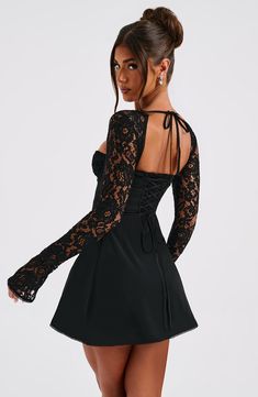 Dreaming of dainty, delicate details? Meet Jacinta, your new fave mini made in luxury chiffon with sheer lace sleeves, an underwired bust and tie details. This A-line milkmaid inspired design will be your go-to throughout the season, whether it's styled with knee high boots for bottomless brunch or high platforms for your next date night. 



Colour: Black.

Luxury chiffon.

Lined in satin.

Long, sheer lace sleeves.

Flared sleeve cuff.

Underwired cups.

Lace up back.

Tie detail at front and Maxi Dress Sale, Sparkle Dress, Satin Mini Dress, Dresses By Length, Formal Dresses Prom, Flowy Dress, Lace Mini Dress, Prom Party Dresses, Corset Dress