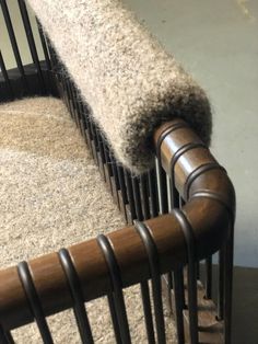 a close up of a bed frame with a rug on the top and bottom part