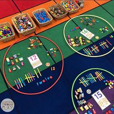 the table is covered with different types of legos and other things to play with