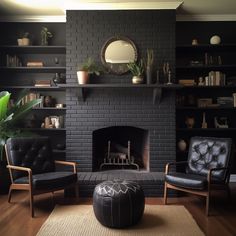 a living room with two chairs and a fireplace