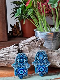 The Hamsa hand is a universal sign of protection power and strength also against negative energies. Made of Acrylic: The design is a vibrant multiplied colored blues one side and  white color on the back. Measure: 3cm width, 4cm drop. Light weight , stainless steel, Hypoallergenic silver hooks & Acrylic  Note: no exchange no refund policy. Thank you 😊 Drop Light, Hamsa Hand, Blue Earrings, Jewelry Earrings Hoops, White Color, Jewelry Earrings, Hoop Earrings, Australia, Crochet