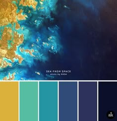 an aerial view of the ocean with blue and yellow colors in it, including water