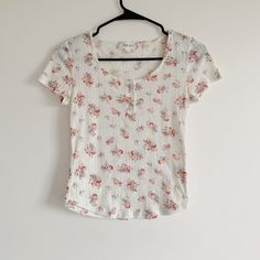 Nwot Super Cute Floral And Intricate Detailed Round Neck Tee With Buttons. Spring Cotton T-shirt With Rose Print, Summer Graphic Tee With Rose Print, White Cotton T-shirt With Rose Print, White Cotton Top With Rose Print, White Cotton Rose Print Top, White Cotton Tops With Rose Print, Summer Rose Print Short Sleeve T-shirt, Summer Short Sleeve T-shirt With Rose Print, Cotton Crew Neck Top With Rose Print