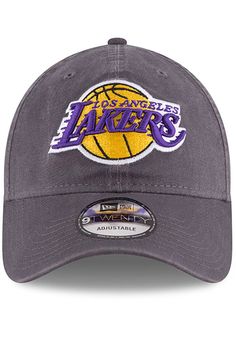 This Los Angeles Lakers Grey Adjustable Hat features a front embroidered team logo on a lightly-structured cotton crown, with pre-curved visor and adjustable backstrap. Team logo embroidered on the front, Cloth Strap Closure to dial in the perfect fit, Relaxed, unstructured fit, Pre-curved bill, 100% cotton construction, New Era Flag logo on side, Dad hat, 100% Cotton, Washable, Imported Team-colored Cotton Hats With Curved Brim, Cotton Hat With Team Logo For Sports Events, Cotton Sports Hat With Team Logo, Team-colored Cotton Hat With Embroidered Logo, Casual Cotton Hat With Team Logo, Casual Cotton Hats For Fan Gear, Collegiate Cotton Hats For Sports Events, Game Day Cotton Hat With Embroidered Logo, Sports Cotton Hat With Logo