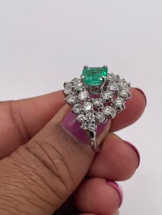 Stunningly gorgeous, Emerald & Diamond Ring set in Platinum. Handmade. Beautiful quality piece of jewelry. Approximately 2.20 ct. in Diamonds, Emerald is nice color & measures 1.15 ct. Diameter of ring is 19mm, size 6 but can be sized. Circa 1950's Emerald Diamond Ring, Diamond Ring Settings, Emerald Diamond, How To Take Photos, Ring Sets, Heart Ring, Emerald, Statement Rings, Diamond Ring