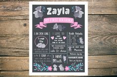 a chalkboard poster with an elephant design on it's back and pink ribbon around the edges