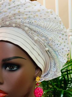 Elegant Stoned Asoke Head Wrap Ready To Wear. Made of Hand woven Asoke Fabric. Please note that the head wrap is pre wrapped. Ready and Easy to wear. Head Wrap: Asoke Auto Gele Main material :Hand woven fabric made in Nigeria Color:White Please feel free to contact me if you hope to know any other details. For the Matching Necklace https://www.etsy.com/listing/623737089/beautiful-swarovski-flat-spiral-necklace?ref=shop_home_active_2 For any question please contact me. Thank you for visiting my s Traditional White Headpiece For Party, Traditional White Party Headpiece, Elegant White Headwrap Headband, Elegant White Headband Headwrap, Elegant White Wedding Turban, Elegant Wedding Headpieces One Size, Elegant Adjustable Headwrap For Wedding, Elegant Fitted White Turban, Elegant White Fitted Turban