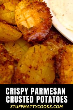 crispy parmesan crusted potatoes with ranch dip in the background and text overlay that says crispy parmesan crusted potatoes