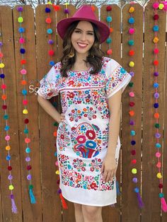 This Beautiful Floral embroidered Dress is the perfect dress to add to your wardrobe. -Its cute enough to dress up for a party or even just wear it to a picnic. -It is handmade and hand embroidered with love by Mexican Artisans in Puebla, Mexico. Short Sleeve Cotton Dress With Geometric Embroidery, Cotton Dresses With Geometric Embroidery And Short Sleeves, White Short Sleeve Embroidered Dress With Geometric Pattern, White Geometric Embroidered Short Sleeve Dress, Spring Embroidered Dress With Multicolor Machine Embroidery, White Short Sleeve Dress With Geometric Embroidery, White Embroidered Dress With Short Sleeves, White Festival Dress With Geometric Embroidery, White Dress With Geometric Embroidery For Festival