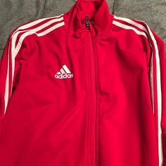 Never Been Worn. Like Brand New University Red Winter Sports Outerwear, University Red Long Sleeve Track Jacket, Red Sporty Track Jacket For Winter, Red Sporty Winter Track Jacket, Sporty Red Track Jacket For Winter, Red Hooded Track Jacket For Fall, Casual University Red Track Jacket For Winter, Casual Red Winter Track Jacket, Red Hooded Track Jacket For Winter