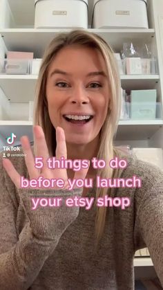 a woman is smiling and holding her hand up in front of her face with the words, 5 things to do before you launch your etsy shop