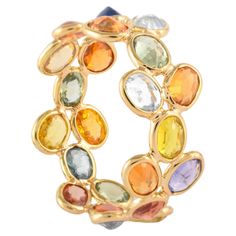 Multi sapphire gemstone eternity band ring in 14K gold symbolises the everlasting love between a couple. It shows the infinite love you have for your partner. The round shape represents love which will continue and makes your promises stay forever. This multi sapphire eternity band helps those who are looking for love immensely. Lightweight and gorgeous, this is a perfect bridesmaid, wedding gift for anyone on your list. Show your endless love by gifting this band to your partner and make her fe Promise Yellow Gold Multi-stone Sapphire Ring, Promise Multi-stone Sapphire Ring In Yellow Gold, Yellow Gold Multi-stone Sapphire Promise Ring, Elegant Multicolor Stackable Eternity Band, Fine Jewelry Multi-stone Sapphire Promise Ring, Multi-stone Sapphire Promise Ring, Elegant 14k Gold Multi-stone Eternity Band, Luxury Yellow Gold Multi-stone Eternity Band, Luxury Multi-stone Yellow Gold Eternity Band