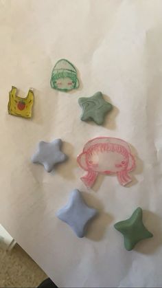 several different shapes and sizes of stars on paper