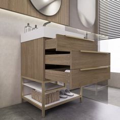 a bathroom with a sink, mirror and drawers