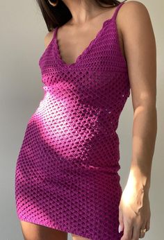 Experience the perfect blend of style and comfort with our crochet 'Beach Berry Mini Dress.' Crafted with vibrant colors, this mini dress will make you stand out in any beach setting. Made for those who value both fashion and comfort. *Please note: This dress does not have a lining and would either need to be worn with a slip or as a swimsuit coverup. Content & Care: 60% Acrylic, 40% Cotton Dry clean only Fitted Crochet Dress For Summer Beach, Fitted Crochet Beach Dress For Summer, Crochet Mini Dress For Party, Beachy Fitted Mini Length Dress, Fitted Crochet Top For Vacation In Summer, Fitted Mini Beach Dress, Fitted Crochet Top For Summer Vacation, Crochet Mini Party Dress, Fitted Crochet Dress For Summer Vacation