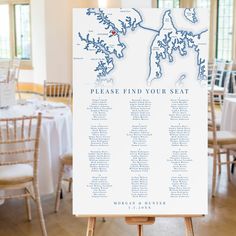 the seating map for this wedding is displayed on an easel in front of tables and chairs