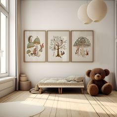 a teddy bear is sitting in front of three paintings on the wall above a bed