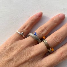 "Welcome to Hidden Glass Atelier! Glad you have found me  ✦ DESIGN    ✧ Design: a minimal colorful fun Murano glass ring set. It is composed by a double or single bubble dots positions on a simple plain glass band. It is made of Murano glass. And the best part is you could customise your fav color to create your own ring set.     ✧ Styling: This contemporary and funky ring is elegant to wear alone, or a set or stack with other metal rings for an interesting mix of material look and a pop of color. It is easy to wear up or down with a casual outfit or for a special occasion. You could find a similar design ring set in sterling silver here: https://hiddenglassatelier.etsy.com/listing/1554597824    ✧ Durability: All the glass jewellery pieces are tempered in a professional kiln for maximum du Handmade Modern Adjustable Stackable Rings, Modern Handmade Adjustable Stackable Rings, Modern Adjustable Handmade Stackable Rings, Modern Glass Rings Suitable For Gifts, Modern Handmade Stackable Rings For Everyday, Modern Multicolor Handmade Rings, Modern Handmade Stackable Rings As Gift, Handmade Unique Midi Rings For Everyday, Unique Handmade Midi Rings For Everyday