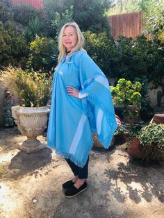 "Poncho top,Large ,knit poncho Blue ,Wool cotton Blend ,Fringed , XL,XXL beautiful large wool and cotton light blue color with soft 2\" fringe Red, Blue Size: Large, XL,XXL fits all sizes, the model is small, medium but this fits up to XXL Width: 52\" Length from top to bottom:36\" Excellent condition- clean, no marks or wear NK26B3 Poncho top,Large ,knit poncho Blue ,Wool cotton Blend ,Fringed" Poncho Top, Knit Poncho, Ladies Poncho, Perfect Together, Poncho Tops, Knitted Poncho, Light Blue Color, Blue Wool, Cotton Lights